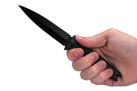 Close-up of Kershaw Secret Agent spear point blade showing edge strength.