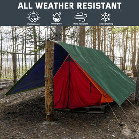Kesfitt 10x20 ft tarp protecting outdoor equipment and vehicles.