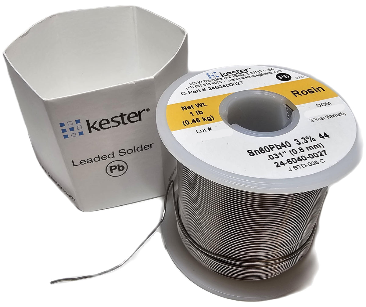 Kester solder on a workbench demonstrates smooth flow for precise electronics assembly.