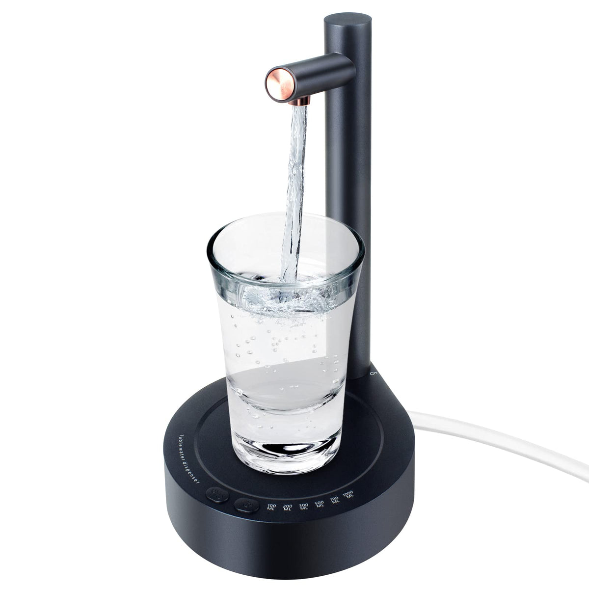 Keweis desktop dispenser on a kitchen counter showing a smooth pour.