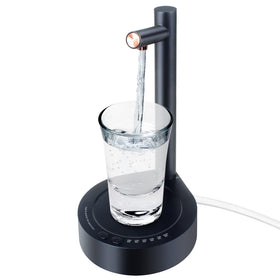 Keweis desktop dispenser on a kitchen counter showing a smooth pour.