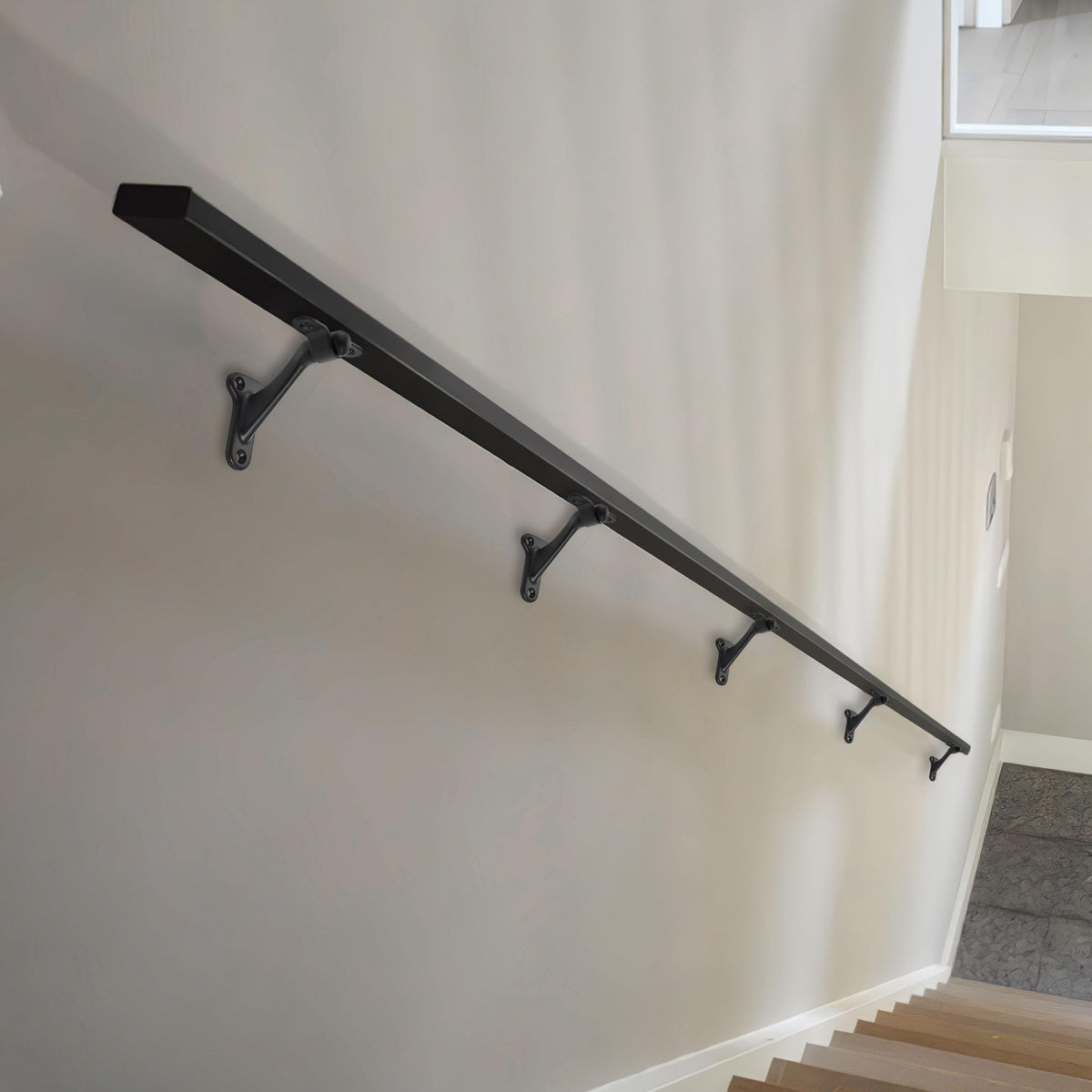 Khtumeware stair rail setup example demonstrating secure, clean matte finish.