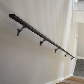 Khtumeware stair rail setup example demonstrating secure, clean matte finish.