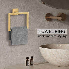 Wall-mounted towel ring provides sturdy support without countertop clutter.