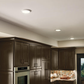 Kichler Gen I LED downlight retrofit-kit over housing illustrates renovation-friendly upgrade.