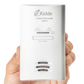 Kidde CO detector mounted at outlet level for easy access