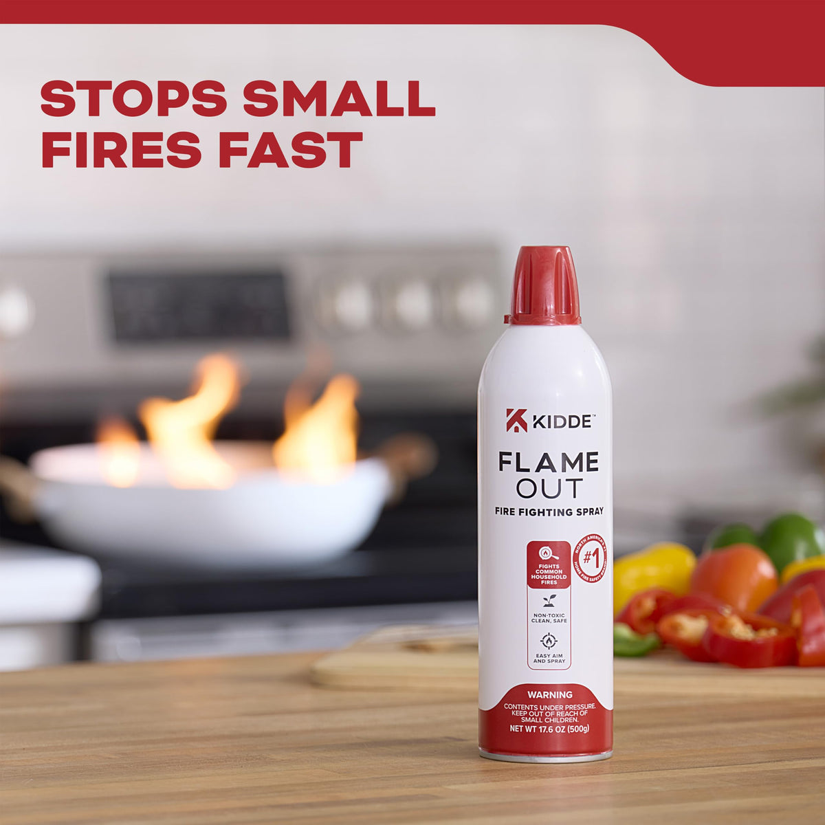 Kidde Flame Out Fire Spray with safety cap removed enables easy aim and spray.