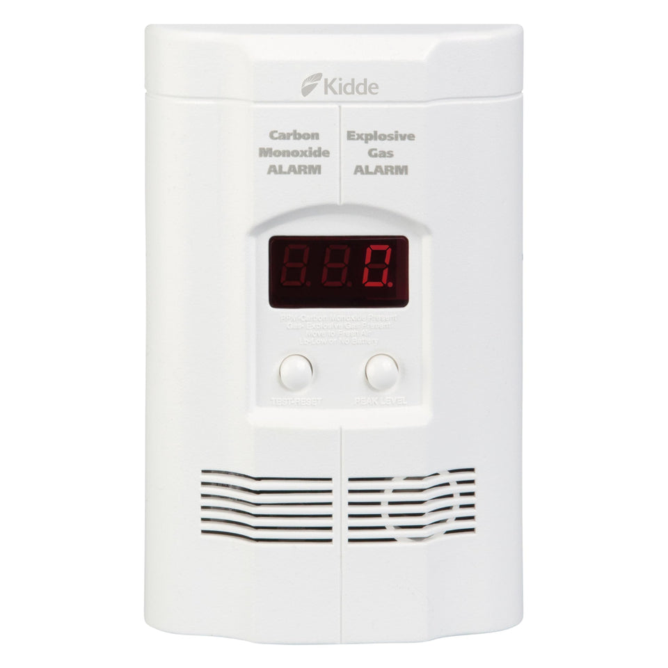 Kidde Nighthawk CO detector mounted on wall outlet for central home protection.
