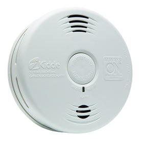 Kidde smoke and CO detector shown mounted on wall with 10-year battery for long-lasting protection.