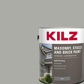KILZ paint on textured wall showing hiding power and adhesion