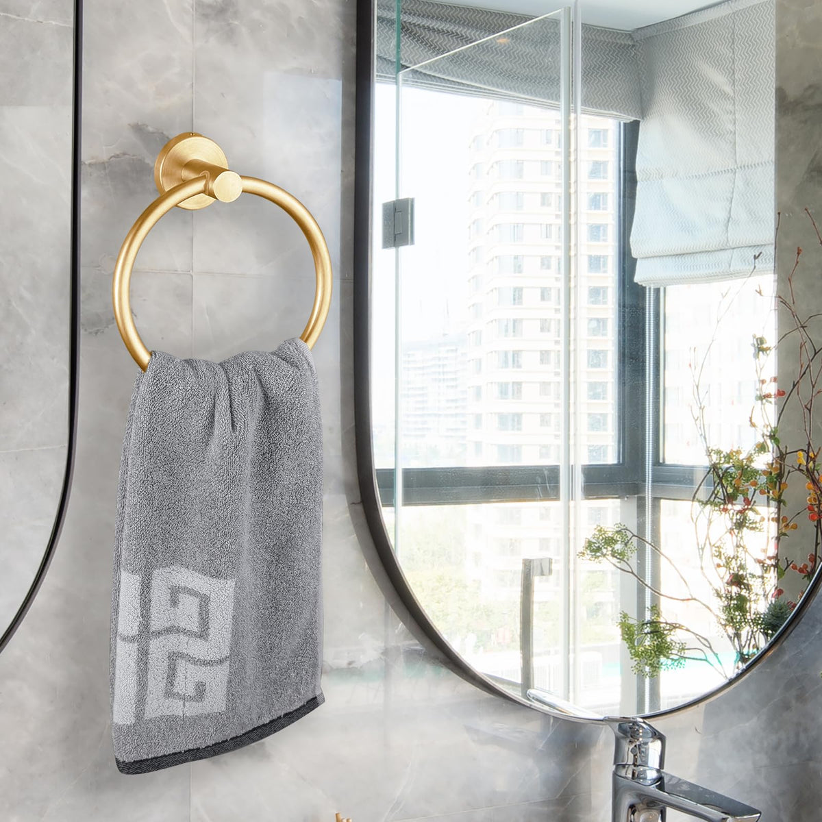 Kinbrace gold towel ring swivel feature enabling flexible drying.