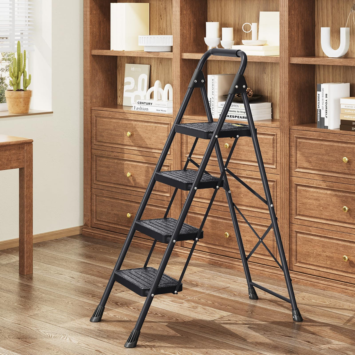 KINGRACK 4-step ladder in use reaching high cabinets.