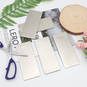 KITANIS 5-piece sharpening stone pack offers versatile grits for various tools.
