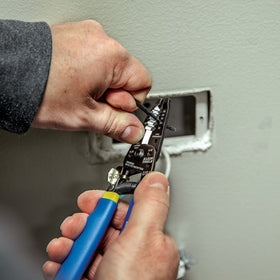 Klein Tools 11055EP looping and bending holes for versatile wire work.