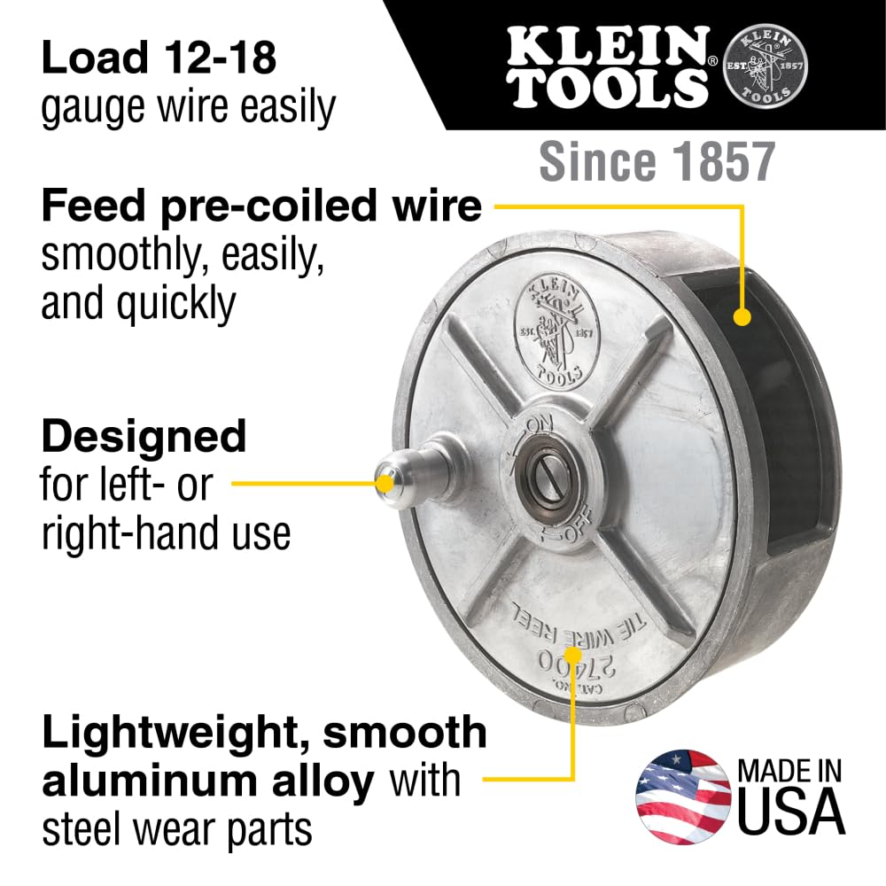 Klein Tools 27400 reel used by left-handed operator with large rewind knob.