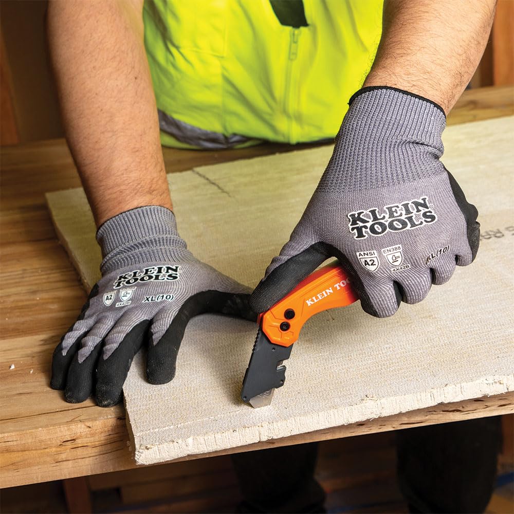 Klein Tools 44313 compact and portable folding knife on belt