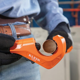 Copper and aluminum tubing being cut with Klein Tools 50046