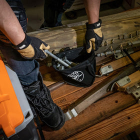 Klein Tools 51A leather-reinforced sides maintain pouch structure during daily use.