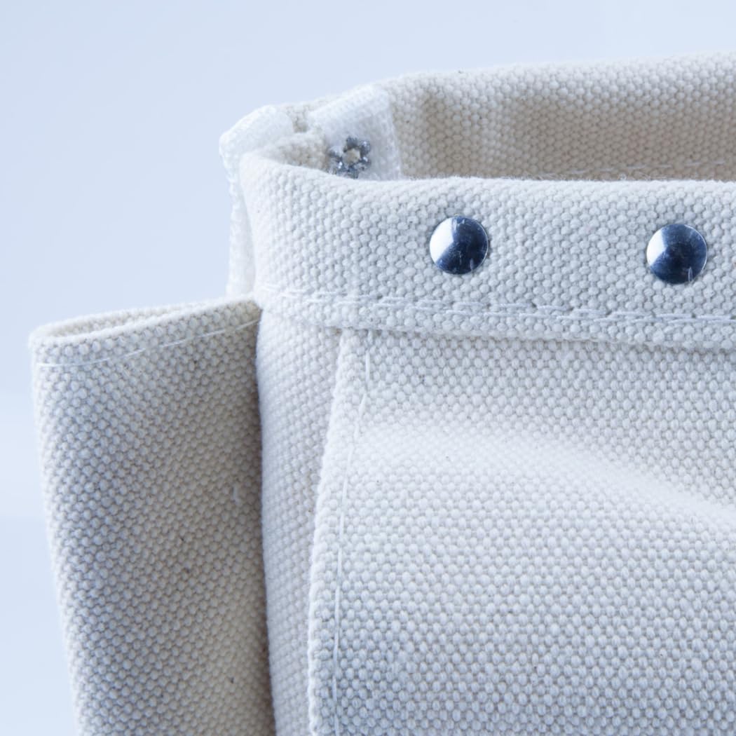 Durable stitching and rivets help the bag endure daily use.
