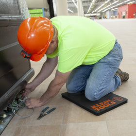 Klein Tools 60135 kneeling pad, handle feature enables quick moves on site.