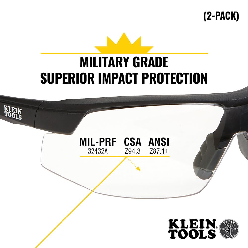 Klein Tools safety glasses with anti-fog coating for clear vision on dusty jobs.