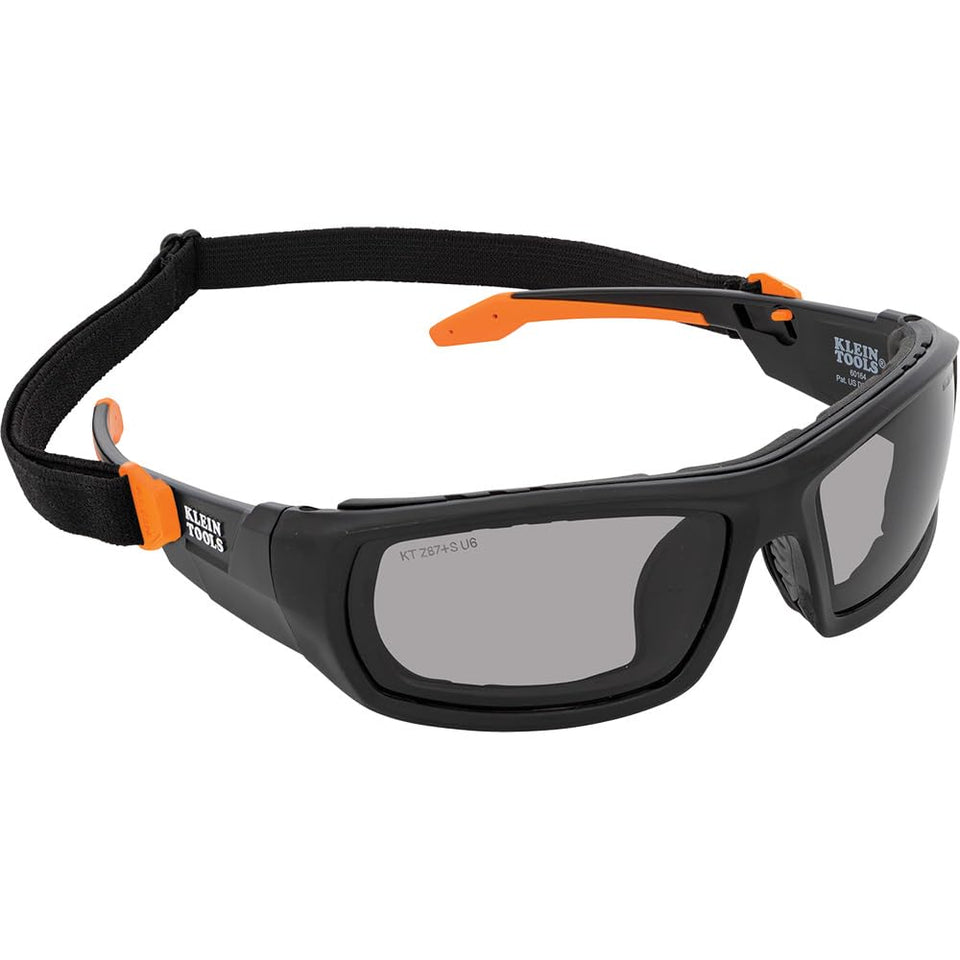 Klein Tools 60471 safety glasses with full-frame gasket shield eyes from dust and debris.