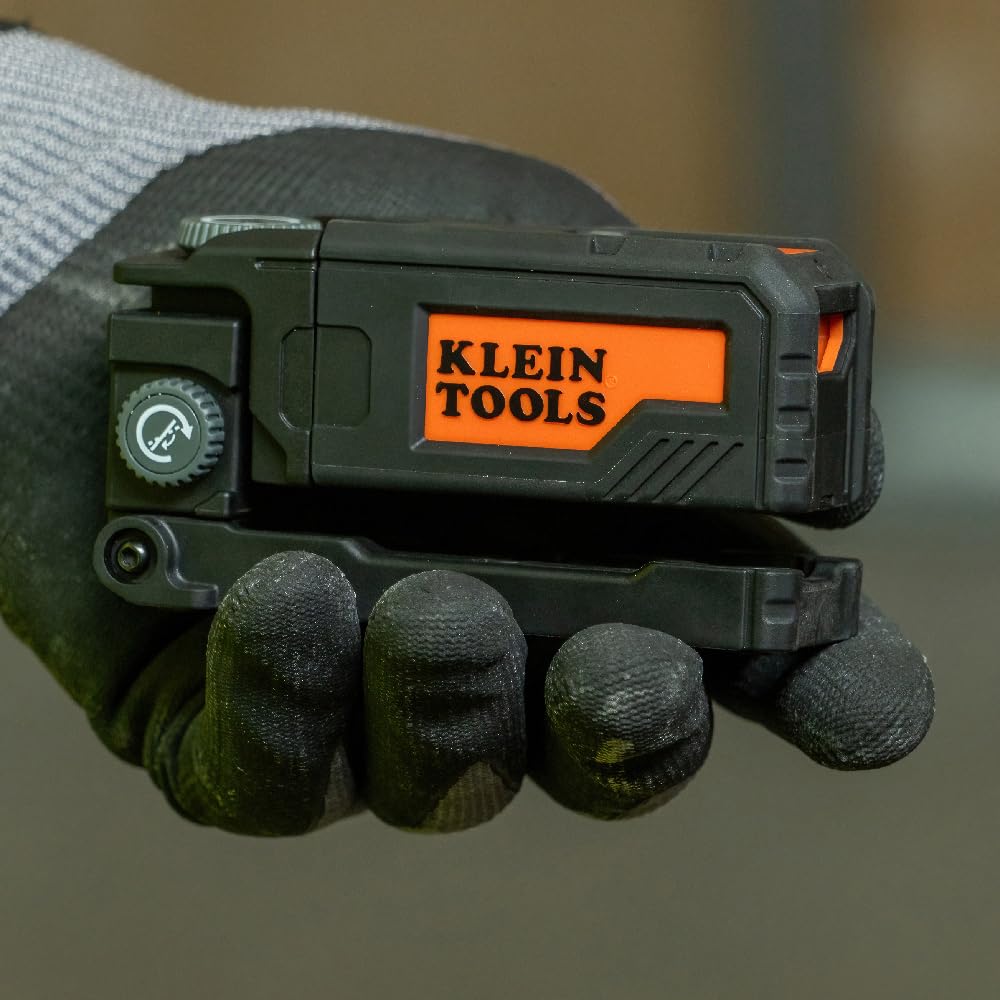 Klein Tools 93PTL red laser line clearly visible in indoor lighting.