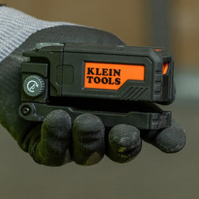 Klein Tools 93PTL red laser line clearly visible in indoor lighting.