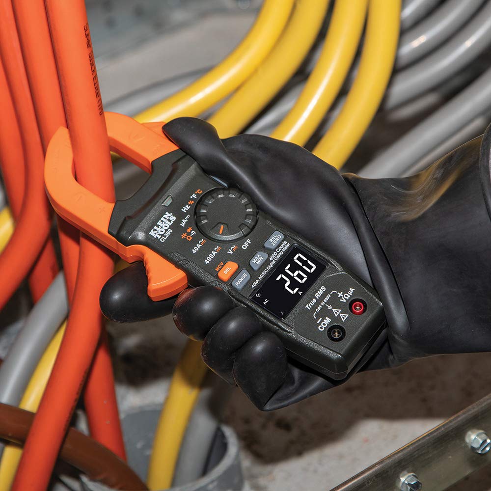 Klein Tools CL390 NCVT testing through the clamp jaw helps quick voltage presence checks.