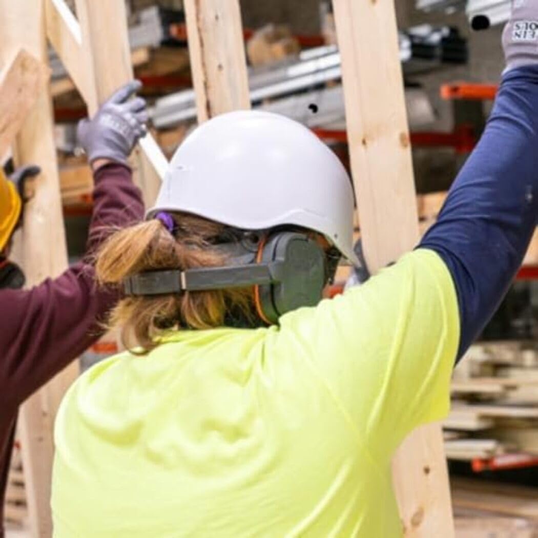 Klein Tools earmuffs offering ergonomic protection on worksites.