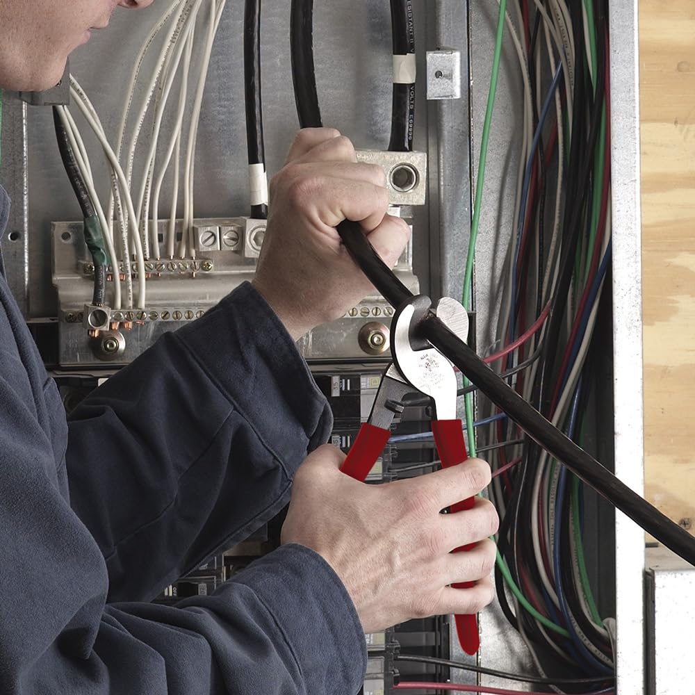 Klein Tools Journeyman Cable Cutter handling communications cable cleanly.