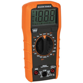 Klein Tools MM320KIT in a tidy workspace highlights professional-grade testing gear.