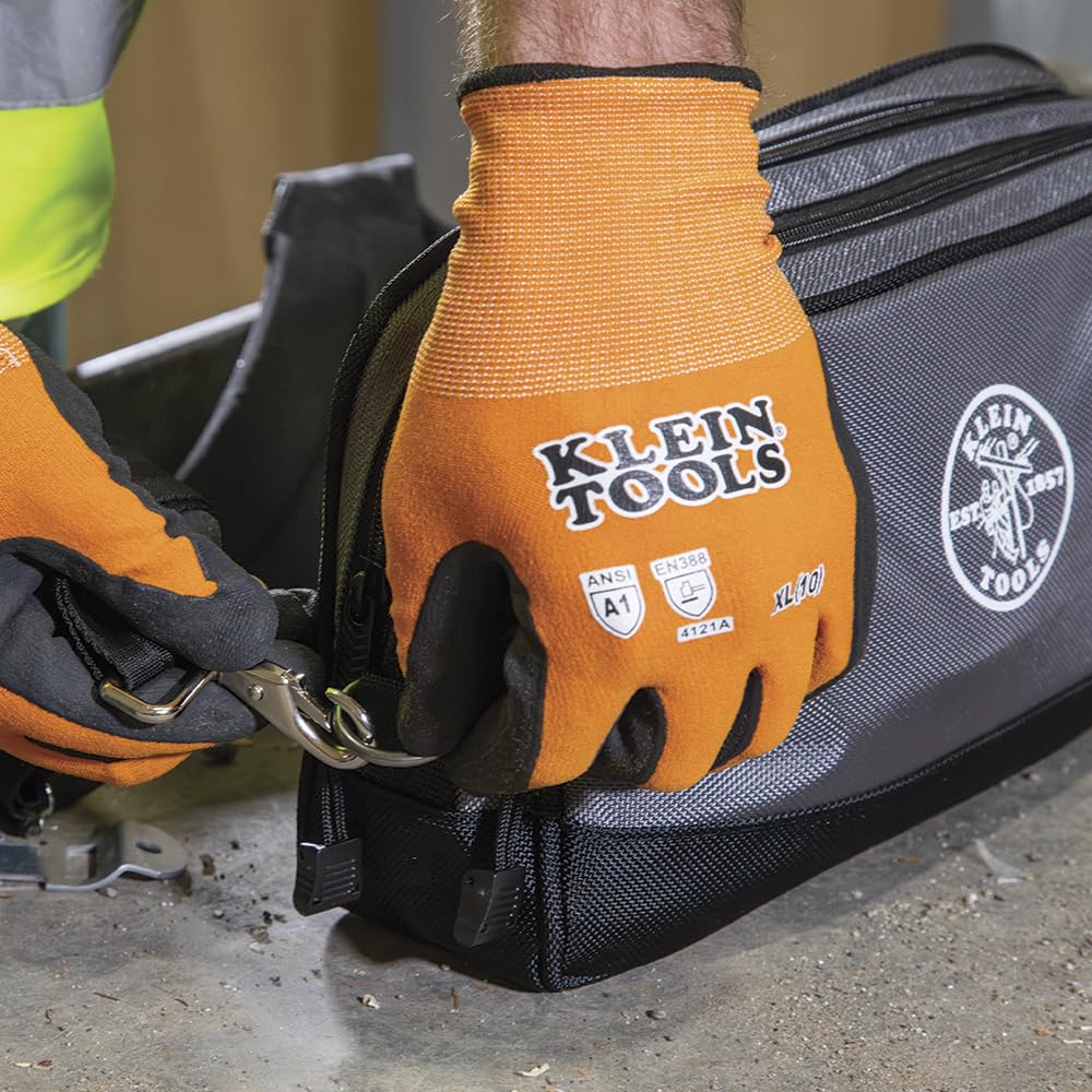 Klein Tools pouch organizes meters, leads, sockets, and gloves