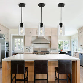 KLSS black pendant light with downrod assembly for vaulted ceilings.