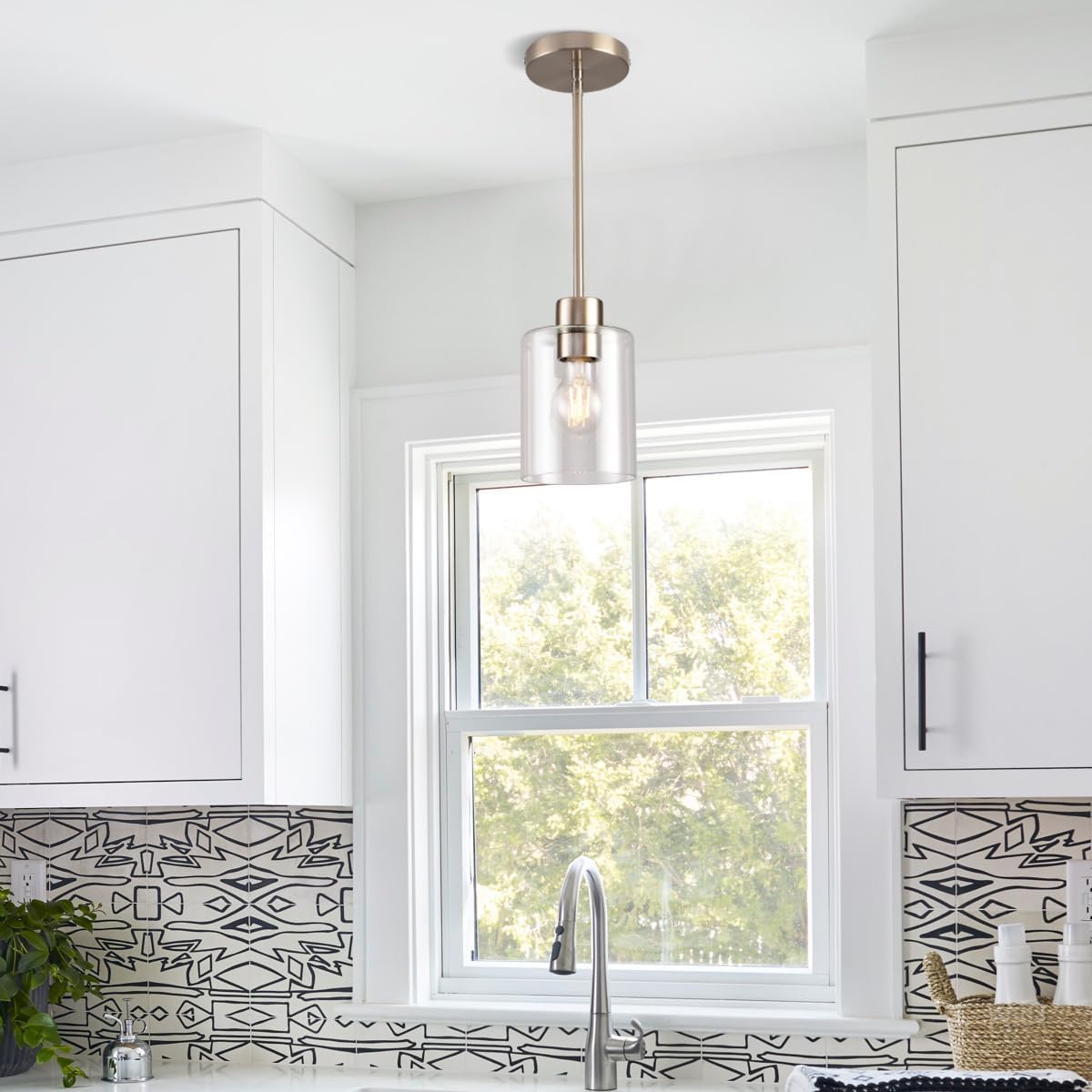 KLSS clear glass shade delivers bright, clean illumination around the sink.