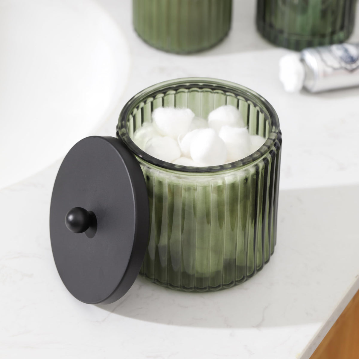 KMwares olive green lid on glass canister for secure storage