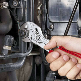 KNIPEX three-piece pliers wrench set displayed in a tool collection for professionals