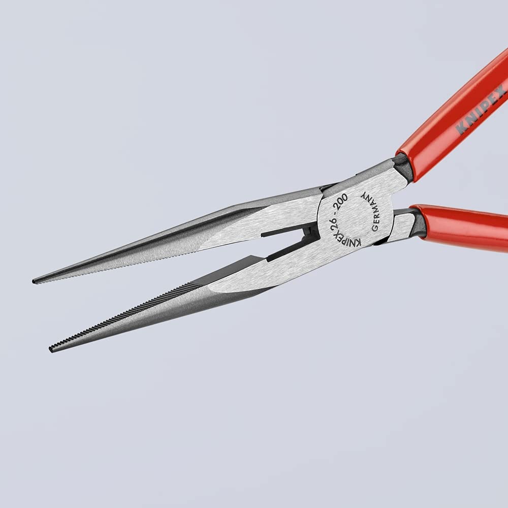 KNIPEX snipe-nose side-cutting pliers enable clean, controlled cuts.