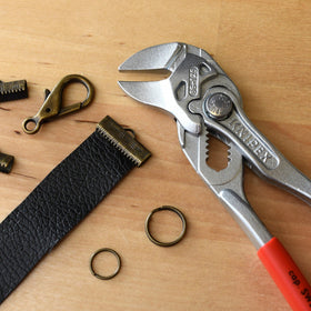 KNIPEX 86 03 125 mini wrench side profile highlighting slim ergonomic handle.