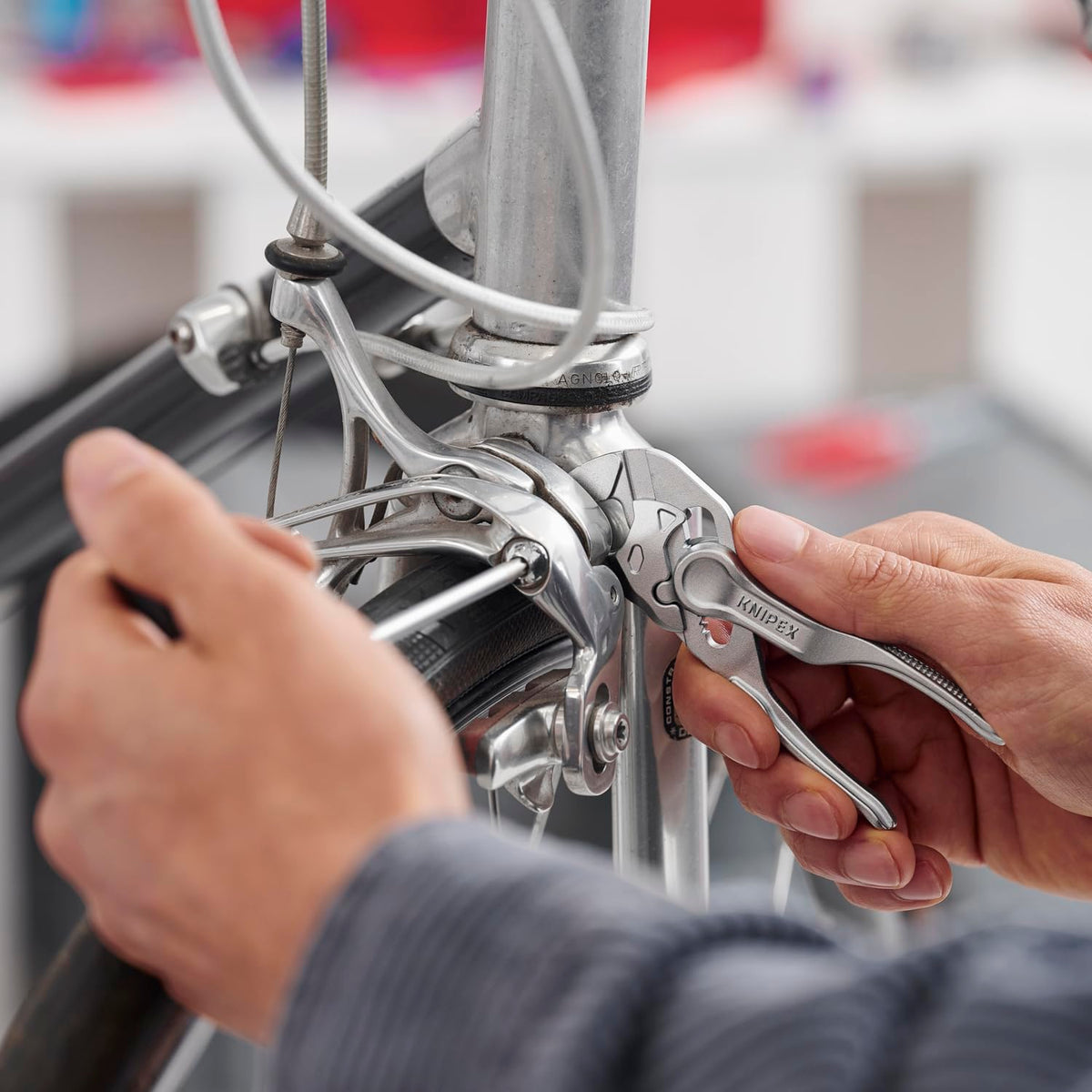 KNIPEX 86 04 100 XS pliers wrench with one-handed quick adjustment up to 3/4 inch.