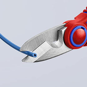 KNIPEX shears in use cutting electrical cable with integrated cutter