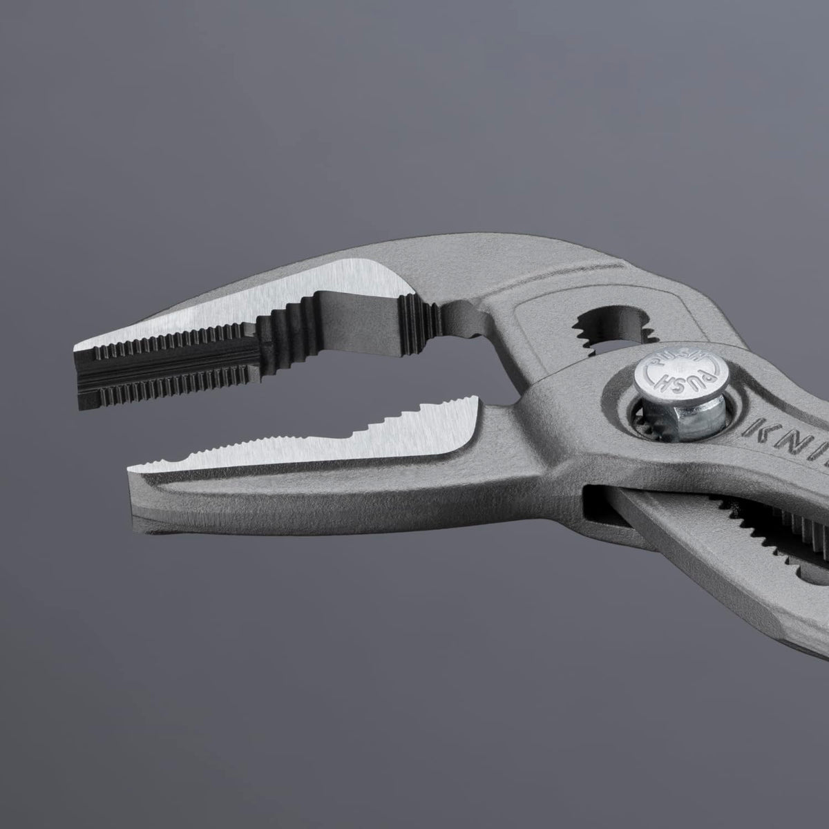 KNIPEX Cobra ES Extra-Slim pump pliers applied in a tight-area task