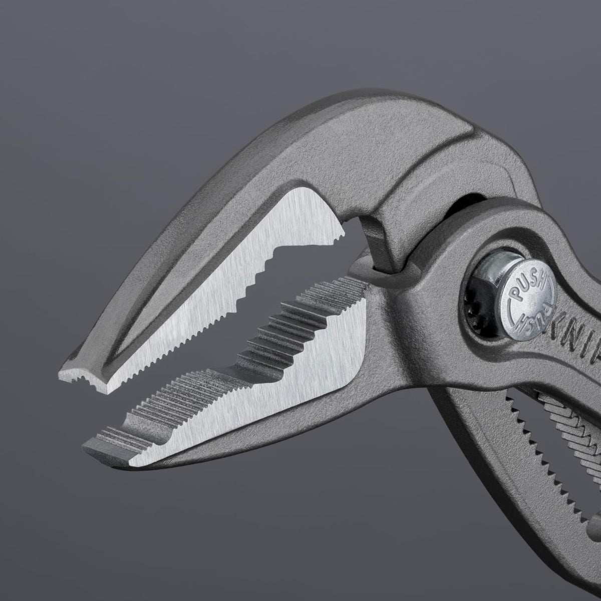 KNIPEX Cobra Extra Slim Pliers front gripping serration secures round parts during work.