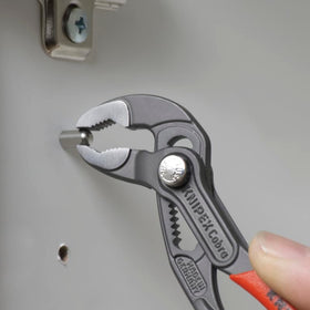 KNIPEX Cobra Pliers 87 01 125 SBA adjustment mechanism demonstrates precise sizing.