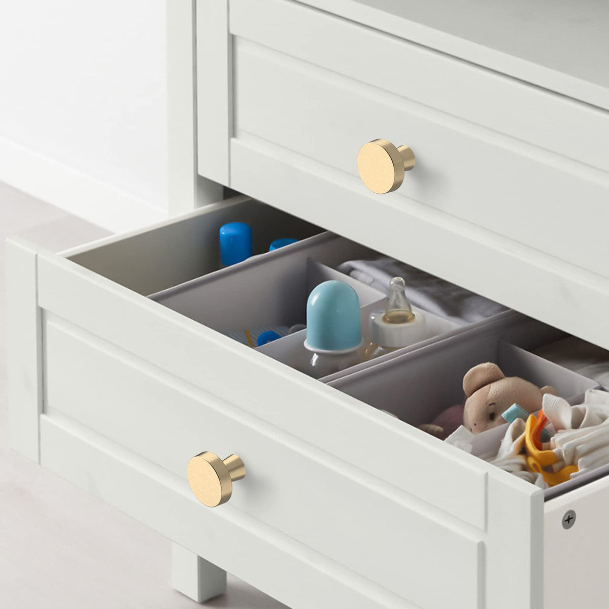 KNOKLOCK brushed gold round knob on dresser for stylish update