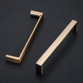 KNOKLOCK square champagne bronze hardware adds modern style to drawers.