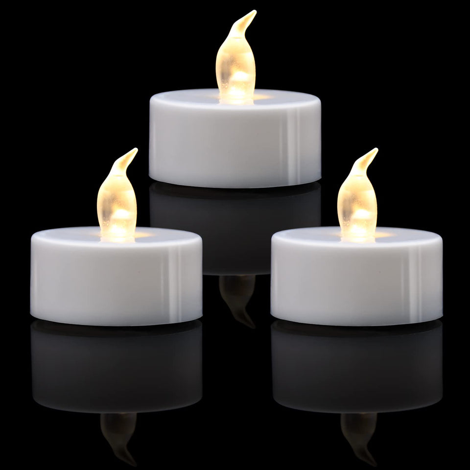 KOABY flameless tea light with warm white flicker for cozy ambiance.