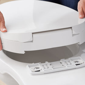 Kohler PureWash M300 self-cleaning wand rinses after use.