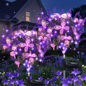 Kohlrabi solar garden lights with lavender flowers illuminate pathways at dusk