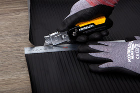 Komelon professional scraping tool demonstrated on edge cleanup tasks